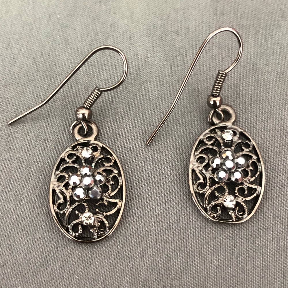 Silver. Jeweled flower oval earrings.